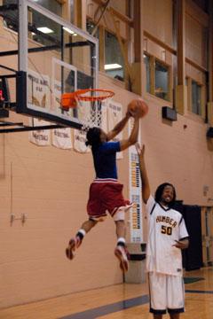 Volleyball player Javon Audair attacks a different kind of net during the Hawks dunk contest Monday. Audair stands 5’7”. Volleyball player Javon Audair attacks a different kind of net during the Hawks dunk contest Monday. Audair stands 5’7”.